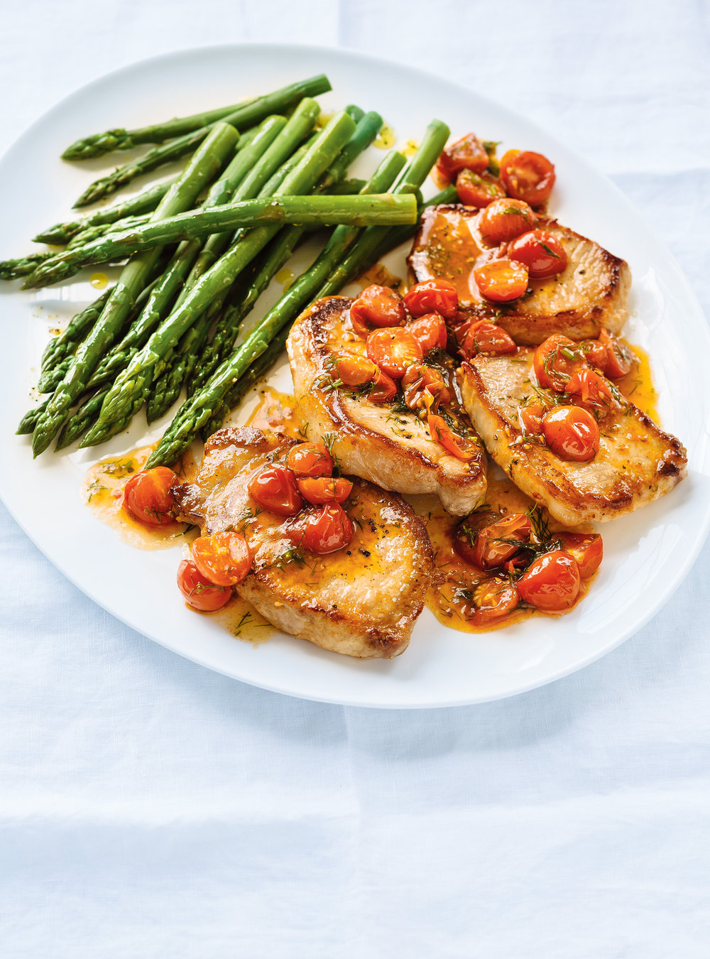 Seared Pork Chops with Wilted Tomatoes