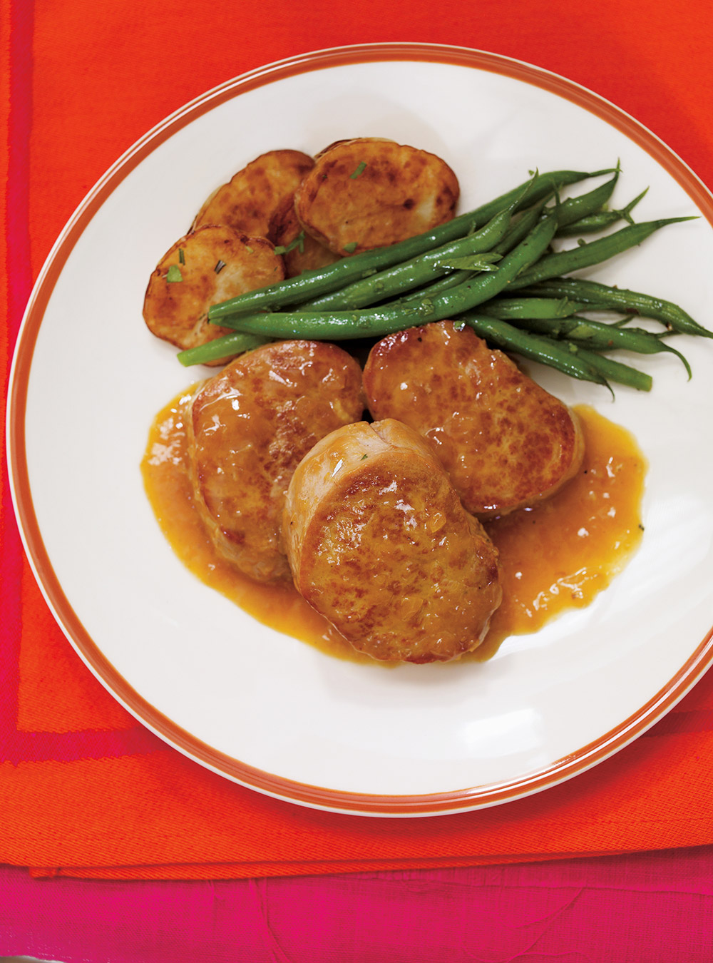 Pork Medallions with Clementine Sauce  