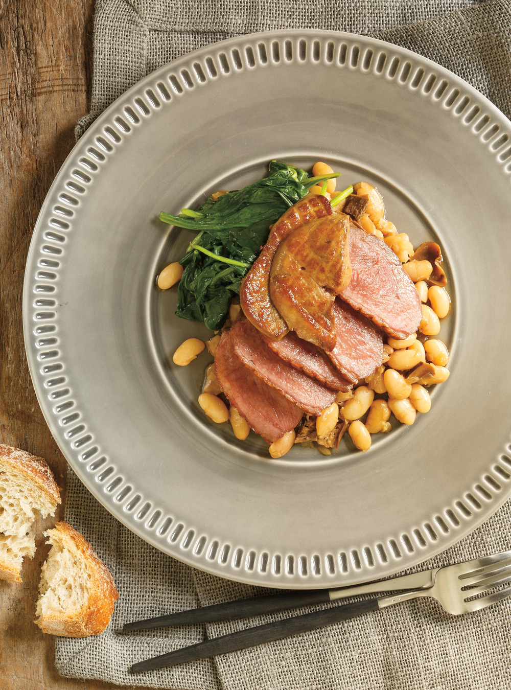 Roasted Duck Breast with White Beans, Boletes and Foie Gras