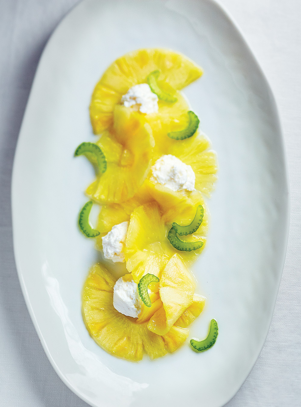 Pineapple Carpaccio with Ricotta Cream and Candied Celery