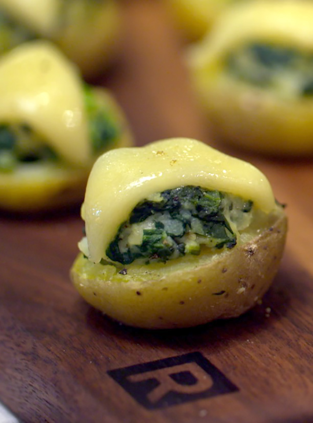 Baby Potatoes Stuffed with Spinach and Emmental