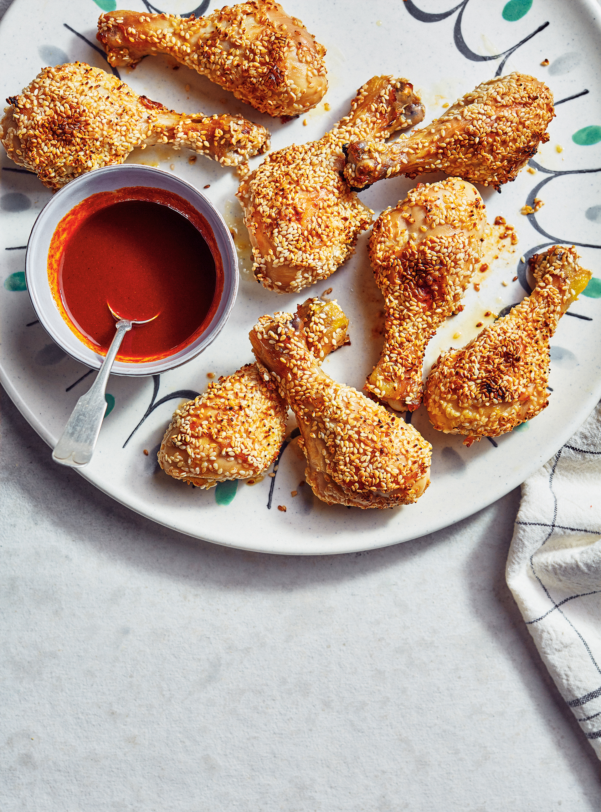 Sesame-Crusted Chicken Drumsticks with Spicy Lemon Sauce