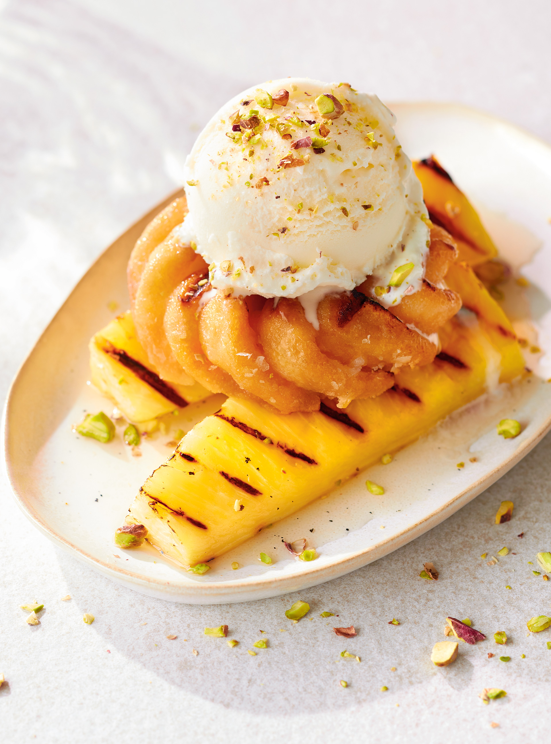 Grilled Pineapple and Doughnuts with Spiced Rum Syrup