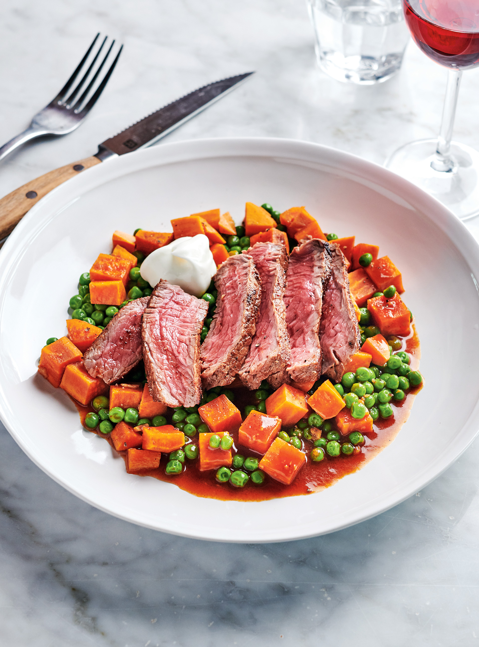 Top Sirloin Steaks with Peas and Sweet Potato