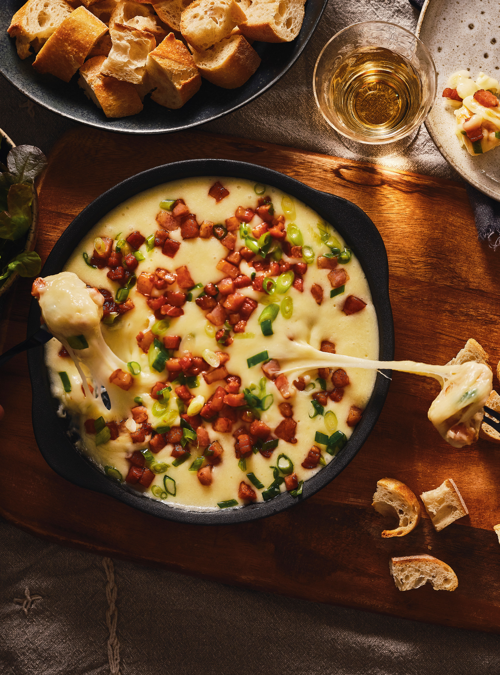 Oven-Baked Cheese Fondue with Bacon and Vermouth