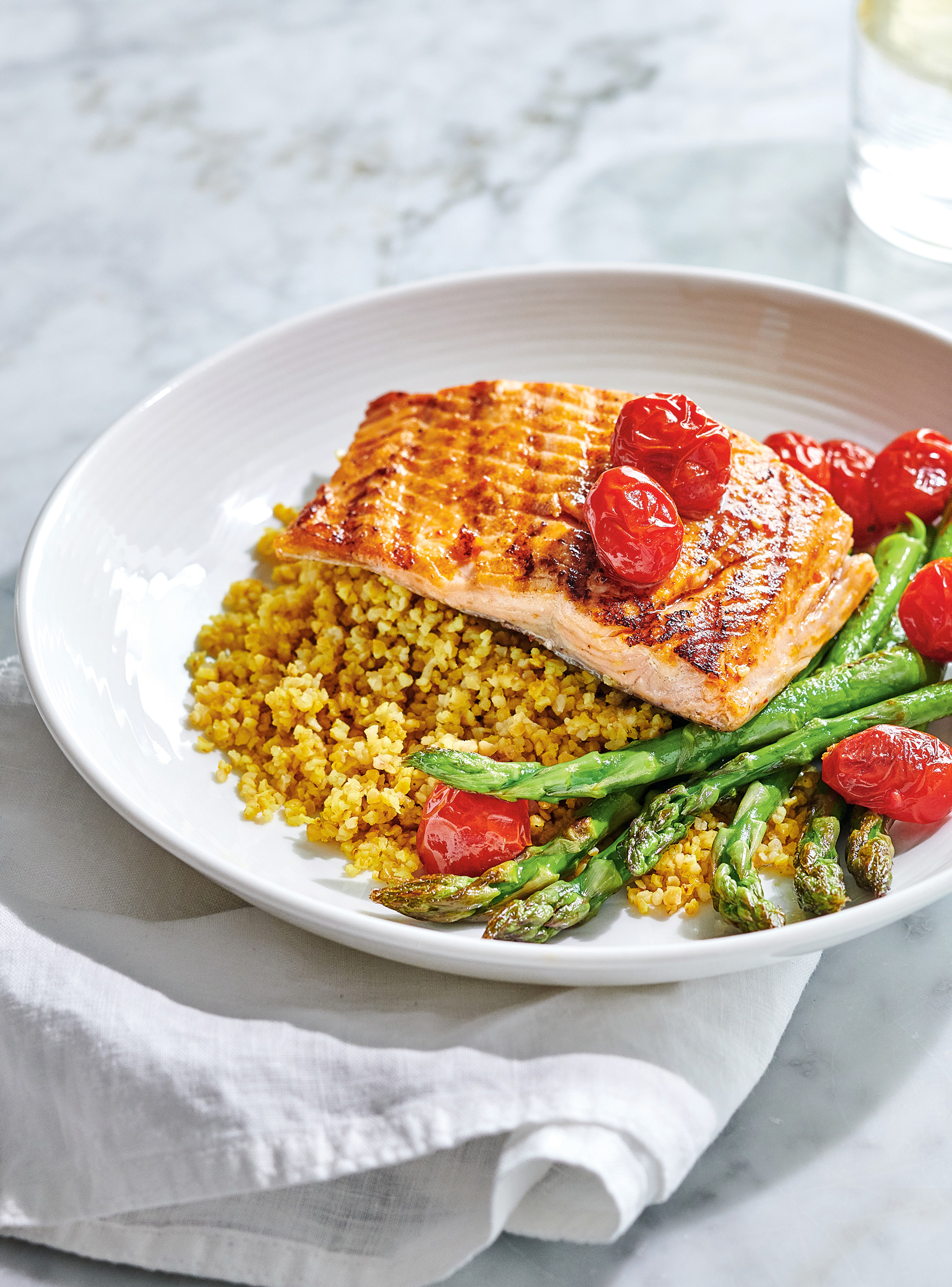 Grilled Trout with Curried Bulgur, Asparagus and Cherry Tomatoes