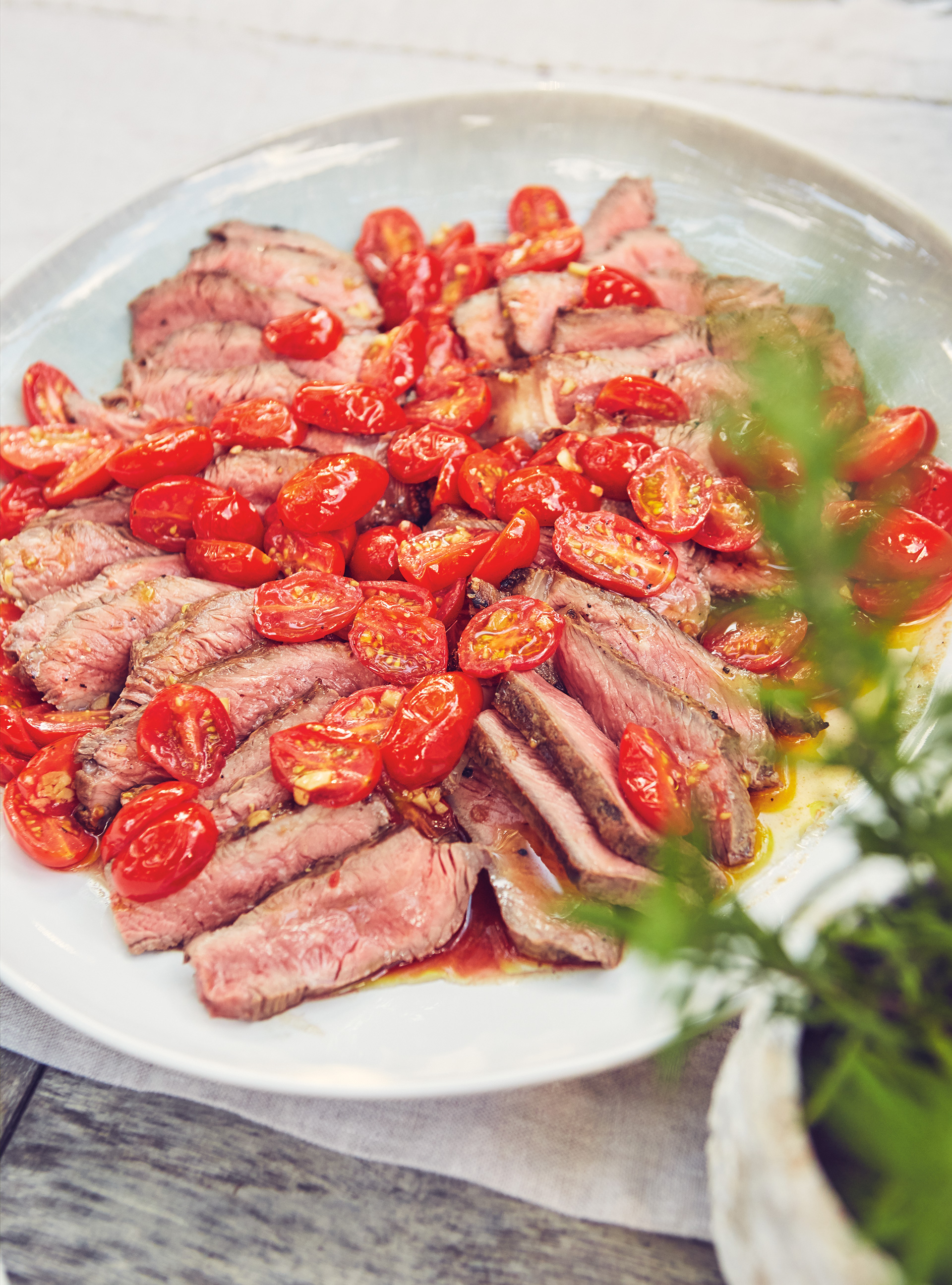 Steaks with Toasted Garlic and Stewed Cherry Tomatoes