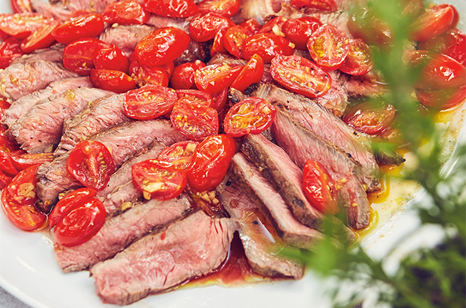Steaks with Toasted Garlic and Stewed Cherry Tomatoes