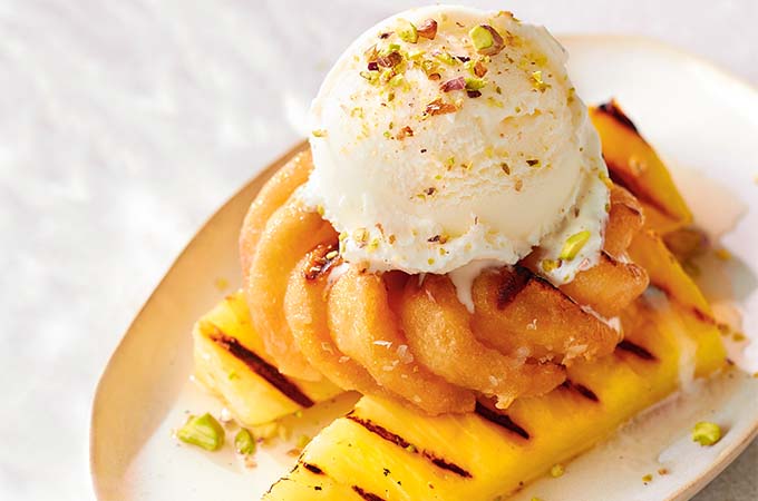 Grilled Pineapple and Doughnuts with Spiced Rum Syrup